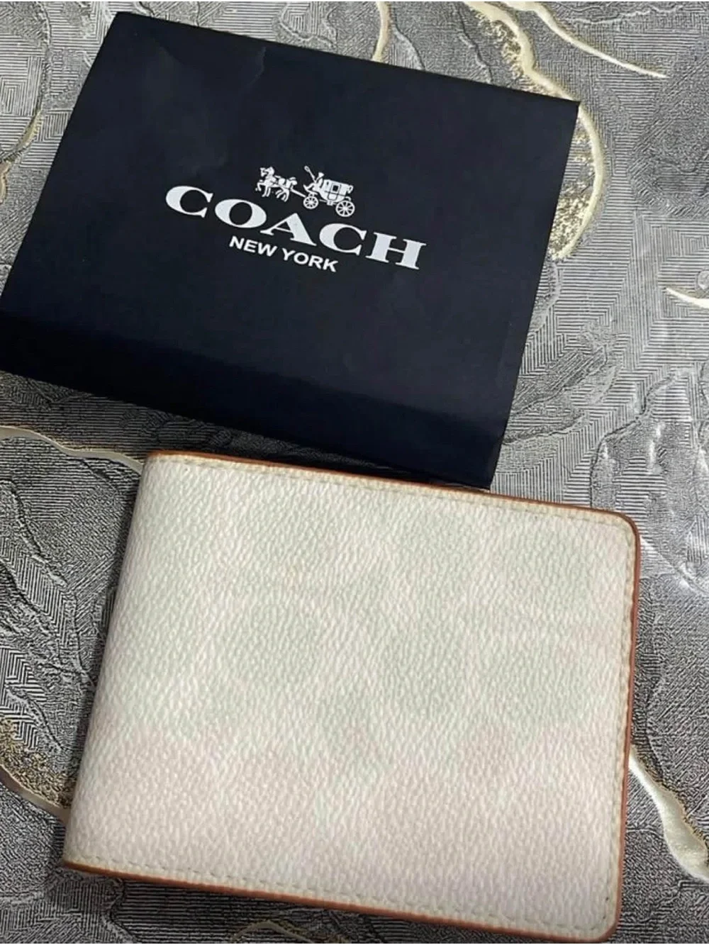 Coach Bifold Card Holders in Black, Brown, and Cream